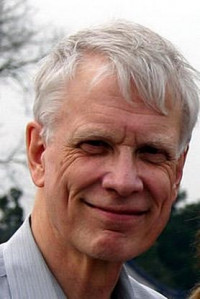 James E. Alcock